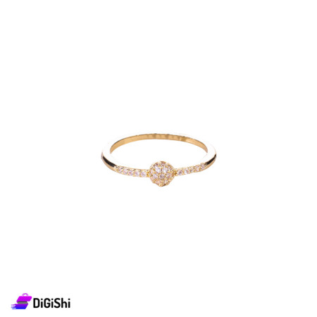 thin gold ring decorated with soft zircon stones