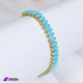 Golden Bracelet With Shiny Turquoise Stones